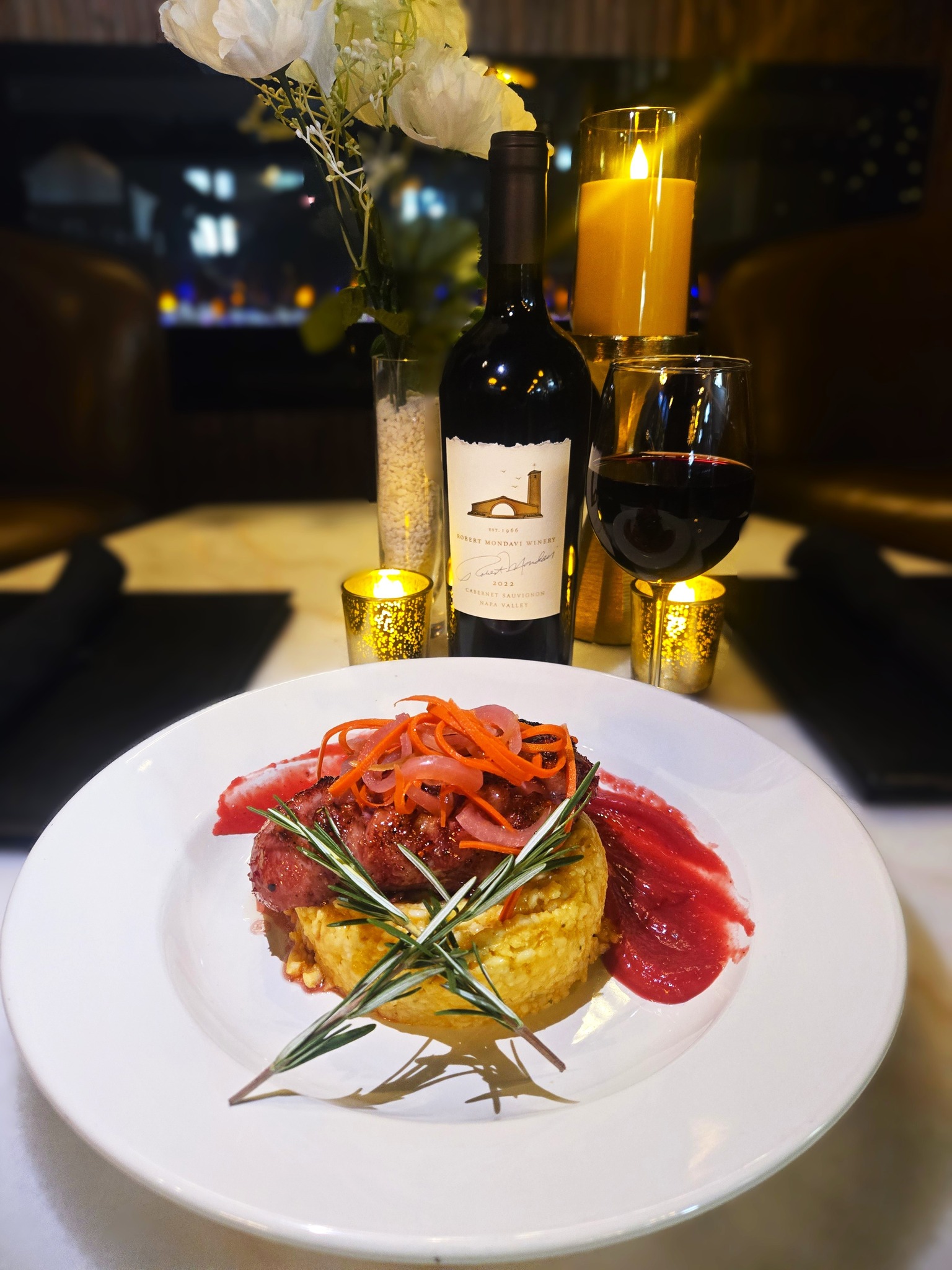 Chef Ryan Baker's seared duck with cherry jus over risotto cake — monthly special at CityWalk Eatery Cedar Rapids